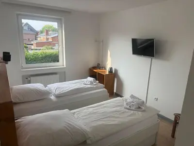 Ein Bett oder Betten in einem Zimmer der Unterkunft M2 Rooms