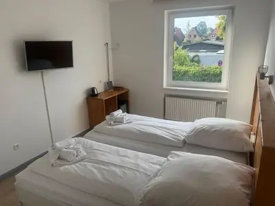 Ein Bett oder Betten in einem Zimmer der Unterkunft M2 Rooms