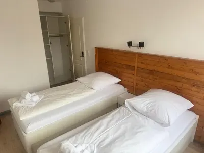 Ein Bett oder Betten in einem Zimmer der Unterkunft M2 Rooms