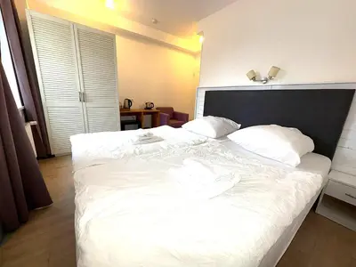 Ein Bett oder Betten in einem Zimmer der Unterkunft M2 Rooms