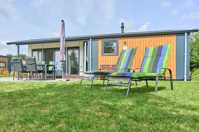 Ein Garten an der Unterkunft Süsel Seeparx Ferienhaus Wassermann