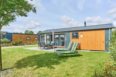 Ein Garten an der Unterkunft Süsel Seeparx Ferienhaus Wassermann