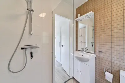 Ein Badezimmer in der Unterkunft Süsel Seeparx Ferienhaus Wassermann