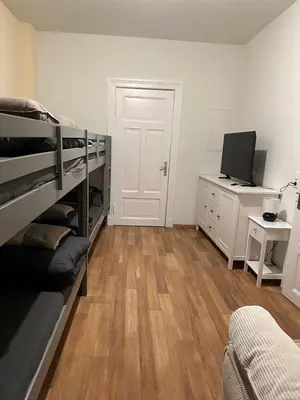 Ein Bett oder Betten in einem Zimmer der Unterkunft Schützen
