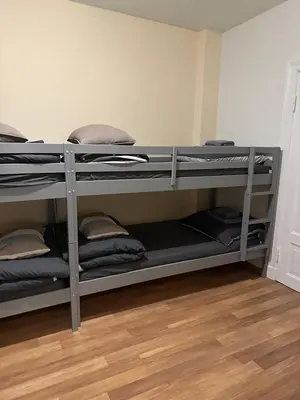 Ein Bett oder Betten in einem Zimmer der Unterkunft Schützen