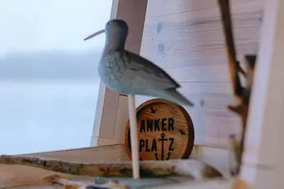Ein Zertifikat, Auszeichnung, Logo oder anderes Dokument, das in der Unterkunft Hausboot Hafenkönig Lübeck ausgestellt ist