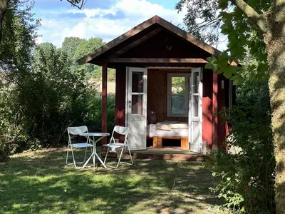 Ein Garten an der Unterkunft Zauberhafte Auszeit im Pferdestall von 1887
