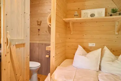 Ein Badezimmer in der Unterkunft Süsel Seeparx Ferienhaus Boarder's Heaven