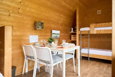 Ein Bett oder Betten in einem Zimmer der Unterkunft Süsel Seeparx Ferienhaus Double Up