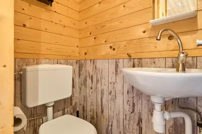 Ein Badezimmer in der Unterkunft Süsel Seeparx Ferienhaus Moby Dick