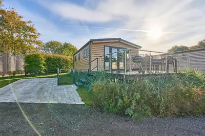 Ein Garten an der Unterkunft Ostseecamp Ferienhaus 