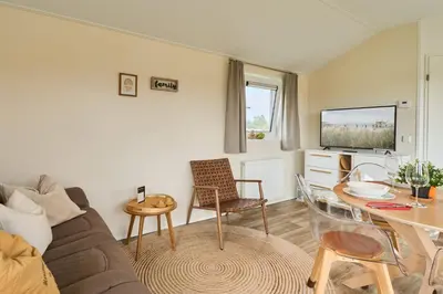 Ein Sitzbereich in der Unterkunft Süsel Seeparx Ferienhaus Carla