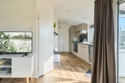 Küche/Küchenzeile in der Unterkunft Süsel Seeparx Ferienhaus Seezauber