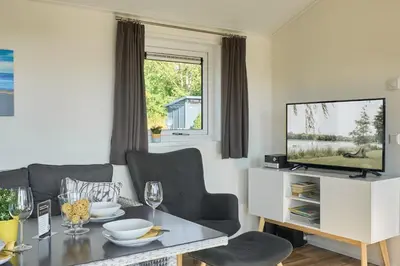 TV/Unterhaltungsangebot in der Unterkunft Süsel Seeparx Ferienhaus Seezauber