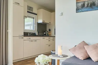 Küche/Küchenzeile in der Unterkunft Süsel Seeparx Ferienhaus Sonnenschein