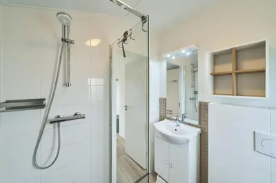 Ein Badezimmer in der Unterkunft Süsel Seeparx Ferienhaus Theres
