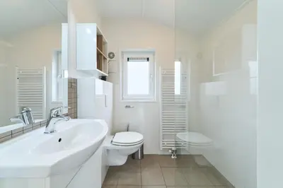 Ein Badezimmer in der Unterkunft Süsel Seeparx Ferienhaus Theres