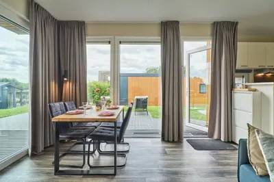 Ein Sitzbereich in der Unterkunft Süsel Seeparx Ferienhaus Delphin