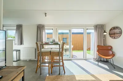 Ein Sitzbereich in der Unterkunft Süsel Seeparx Ferienhaus Seezeit