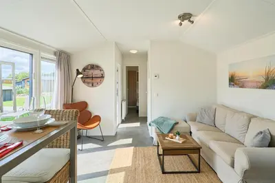 Ein Sitzbereich in der Unterkunft Süsel Seeparx Ferienhaus Seezeit