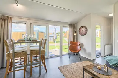 Ein Sitzbereich in der Unterkunft Süsel Seeparx Ferienhaus Seeflüstern