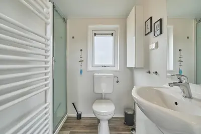 Ein Badezimmer in der Unterkunft Süsel Seeparx Ferienhaus Seehafen