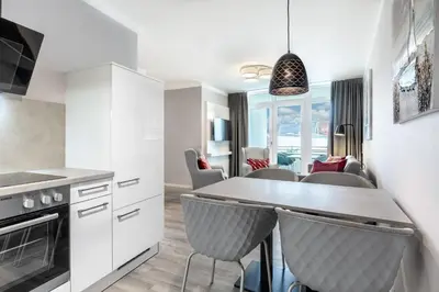 Küche/Küchenzeile in der Unterkunft Godewindpark Deluxe-Suite 1-17 mit West-Loggia