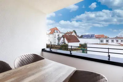 Ein Balkon oder eine Terrasse in der Unterkunft Godewindpark Deluxe-Suite 1-17 mit West-Loggia
