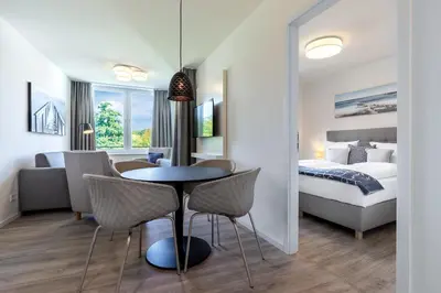 Ein Bett oder Betten in einem Zimmer der Unterkunft Godewindpark Deluxe-Apartment 2-16