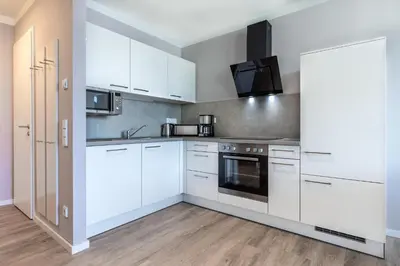 Küche/Küchenzeile in der Unterkunft Godewindpark Deluxe-Suite 1-15