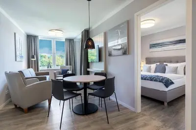 Ein Bett oder Betten in einem Zimmer der Unterkunft Godewindpark Deluxe-Apartment 2-14 mit eigener e-Ladesäule, XL-Strandkorb und Hundefreundlich