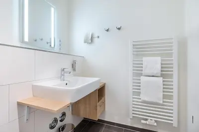 Ein Badezimmer in der Unterkunft Godewindpark Deluxe-Apartment 1-11