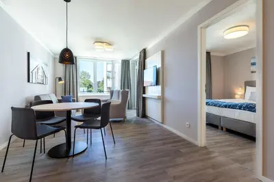 Ein Bett oder Betten in einem Zimmer der Unterkunft Godewindpark Deluxe-Suite 1-13