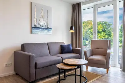 Ein Sitzbereich in der Unterkunft Godewindpark Deluxe-Apartment 1-12