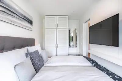 Ein Bett oder Betten in einem Zimmer der Unterkunft Godewindpark Deluxe-Apartment 1-12
