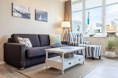 Ein Sitzbereich in der Unterkunft Godewindpark Deluxe-Suite 2-05