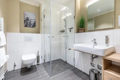 Ein Badezimmer in der Unterkunft Godewindpark Deluxe-Suite 2-05