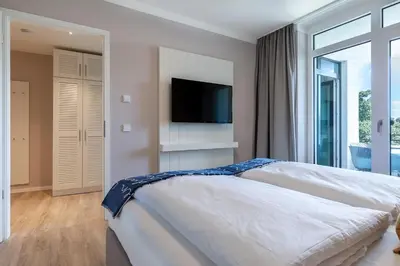 Ein Bett oder Betten in einem Zimmer der Unterkunft Godewindpark Exklusives Apartment 3-04