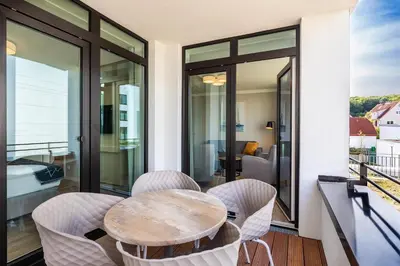 Ein Sitzbereich in der Unterkunft Godewindpark Deluxe-Suite 1-09