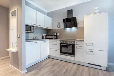 Küche/Küchenzeile in der Unterkunft Godewindpark Exklusives Apartment 3-10