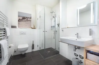 Ein Badezimmer in der Unterkunft Godewindpark Deluxe-Apartment 1-06