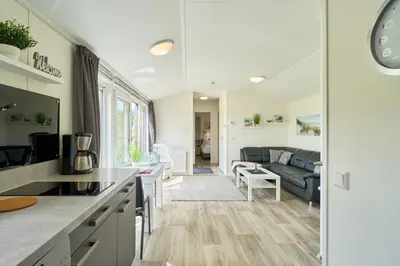 Küche/Küchenzeile in der Unterkunft Süsel Seeparx Ferienhaus Seewind mit Zaun