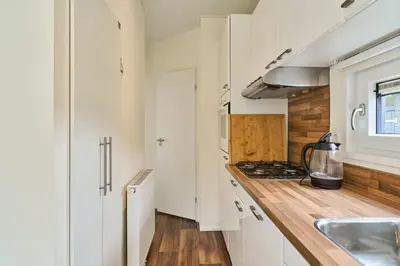 Küche/Küchenzeile in der Unterkunft Süsel Seeparx Tinyhouse Ostsee
