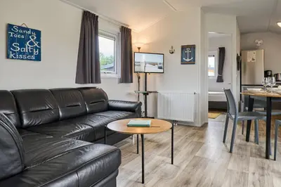 Ein Sitzbereich in der Unterkunft Süsel Seeparx Ferienhaus Ankerplatz
