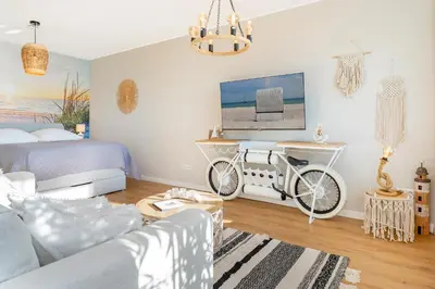 Ein Sitzbereich in der Unterkunft Panoramic Loft mit Meerblick