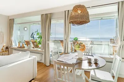 Ein Sitzbereich in der Unterkunft Panoramic Loft mit Meerblick