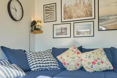 Ein Sitzbereich in der Unterkunft Süsel Seeparx Ferienhaus Seeberg