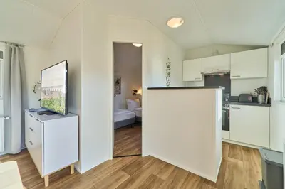 Küche/Küchenzeile in der Unterkunft Süsel Seeparx Ferienhaus Seeberg