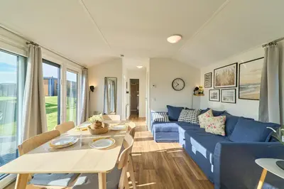 Ein Sitzbereich in der Unterkunft Süsel Seeparx Ferienhaus Seeberg