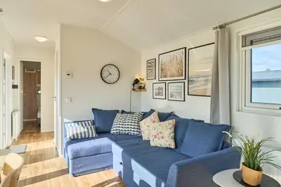Ein Sitzbereich in der Unterkunft Süsel Seeparx Ferienhaus Seeberg